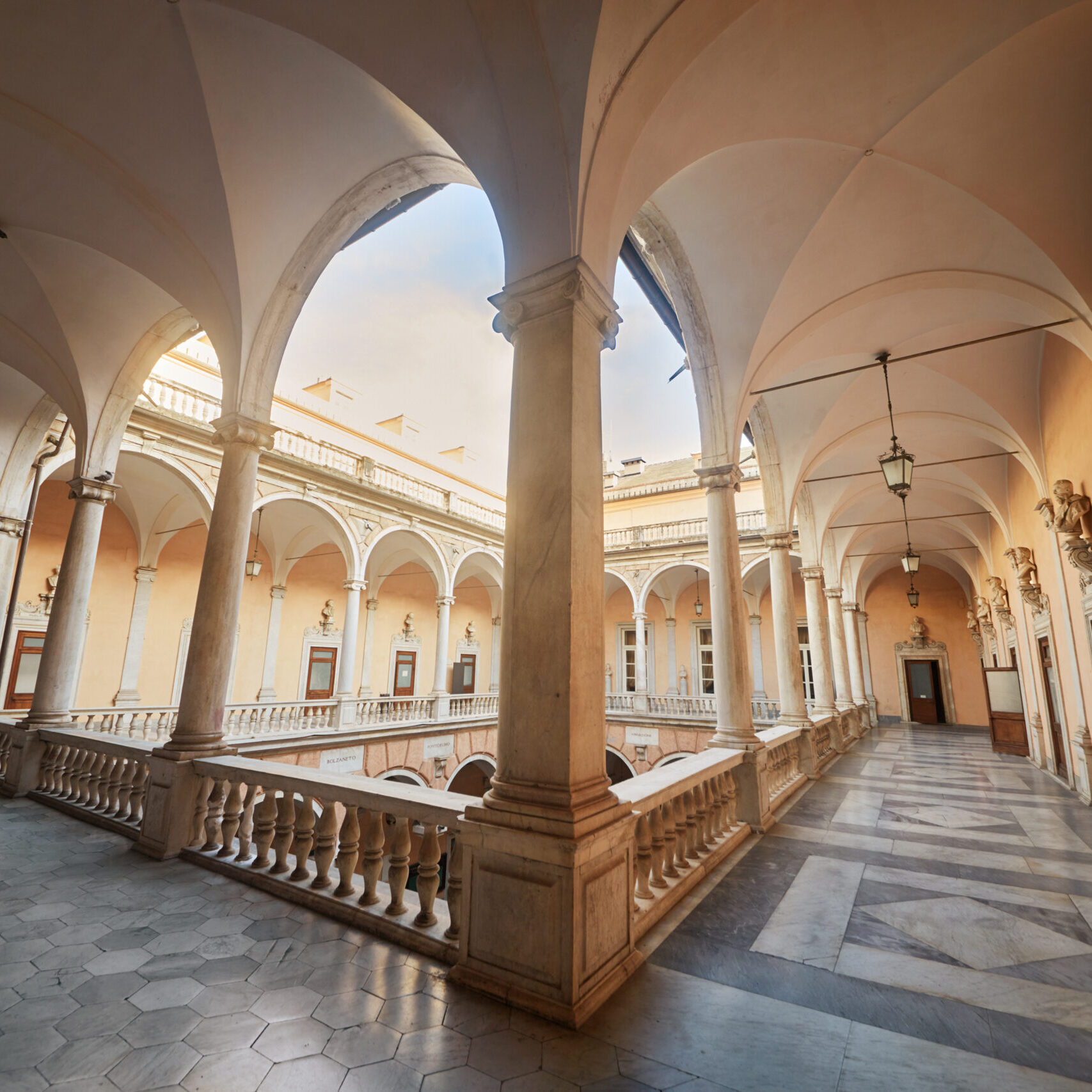 GENOA, ITALY - AUG 6, 2016: Arcade at Doria Tursi Palace in Geno GENOA, ITALY - AUG 6, 2016: Arcade at Doria Tursi Palace in Genoa. This palace, one of three that together make up the Musei di Strada Nuova.